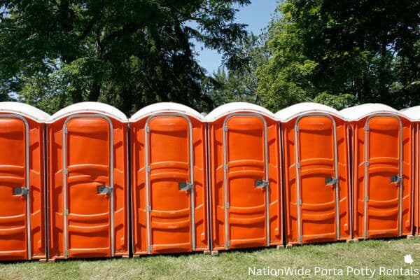 a lineup of clean and well-maintained portable loos for workers in California